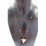 15ct gold shark tooth pendant necklace, the necklace with six pearls, weight overall 5.4g approx.
