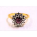 18ct gold diamond & ruby cluster ring, the ruby of 0.50ct spread approx, weight 3.9g approx