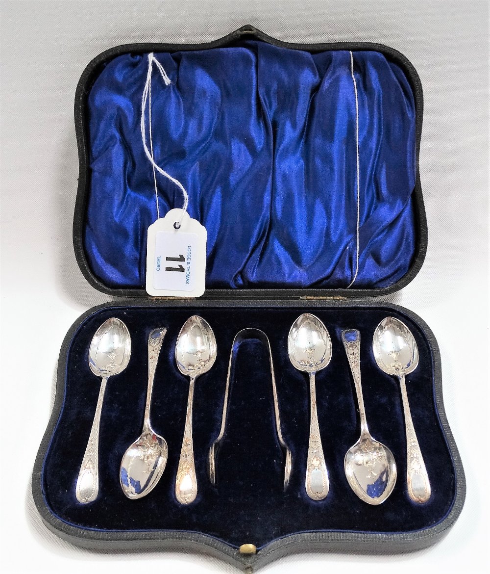 Edwardian silver cased set of six demi-tasse spoons and sugar tongs, foliate bright cut, maker HA,