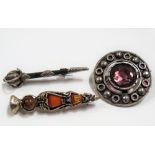 Silver & hard stone Scottish brooch in the form of a sword together with two other Scottish