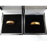 Two 22ct hallmarked gold wedding bands, weight overall 5.1g approx