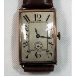 1920's Art Deco 9ct gold cased gentleman's manual-wind wristwatch, the 22mm rectangular silvered