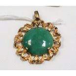 Yellow metal circular jade set pendant, diameter 30mm, weight overall 6.4g approx