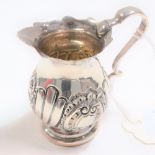 Victorian half fluted and foliate embossed cream jug, maker W.D., Birmingham 1897, height 7cm,
