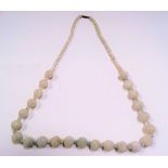 Chinese pale Celadon jade bead necklace with 9ct gold clasp, with 23 large circular fluted beads