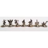 Set of seven Siam sterling silver menu holders, with weighted bases, each with a cast holder