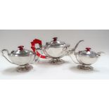 Continental 98% silver Art Deco three piece bachelor tea set, the teapot with red Bakelite handle
