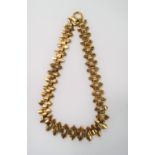 A Victorian gold plated fancy link chain, each link foliate engraved, length 44cm x width 2cm.