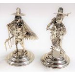 Pair of Chinese sterling silver figures of peasants indistinctly signed & stamped 'Sterling Silver