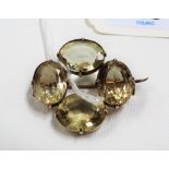 Gold mounted citrine set four stone brooch with base metal pin, width 38mm