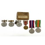 Group of WWII medals with associated medals, including a 1924 'Life Saved' medal to a female