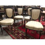 Set of four 19th Century French walnut ebonised and gilded carved salon chairs with upholstered back