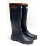 A pair of ladies Barbour black wellington boots with brown leather trim and tartan lining, size 6