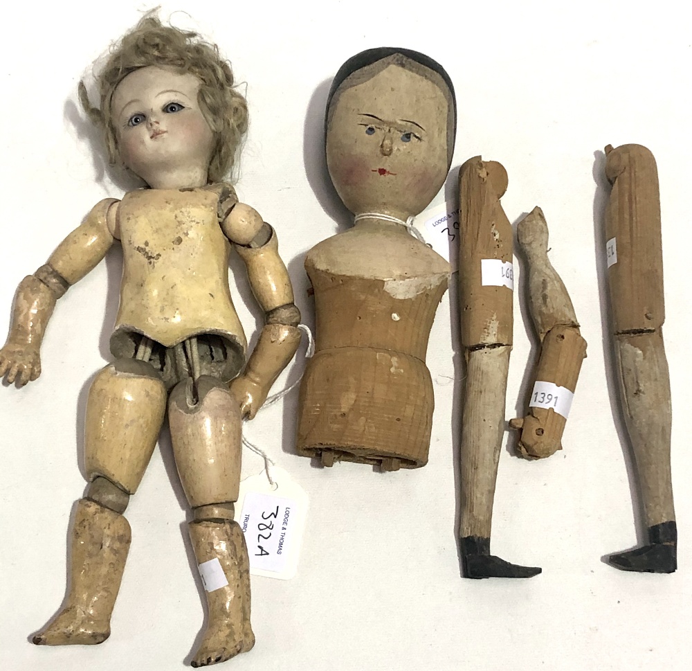 19th Century painted pine peg doll with detached legs and arm (one arm missing), height 37cm approx;