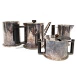 Trench Art four piece silver plated tea set with military stamps to the base and with wood hexagonal