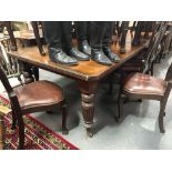 Victorian mahogany rectangular standing dining table with two extra leaves, the rectangular top with