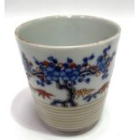 A Chinese Imari beaker, decorated with trees and with a half ribbed and gilt banded body, the