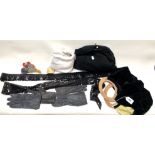 Mixed textiles to include two pairs of ladies leather gloves, two sequin belts, a black velvet
