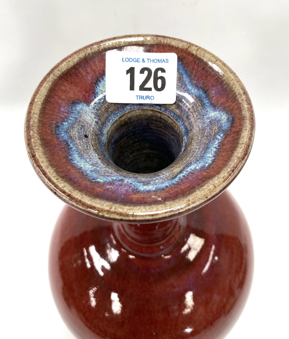 A Chinese stoneware sang de boeuf glaze flared neck bottle vase, height 25cm. - Image 2 of 2