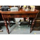 Victorian mahogany fold over tea table raised on four turned baluster legs, width 90cm.