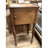 19th Century walnut pot cupboard with turned legs.