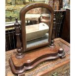 Victorian mahogany swing toilet mirror with lobed turned supports, width 53cm.