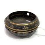 An 18th century leather covered brass outer pocket watch case, diameter 5cm.