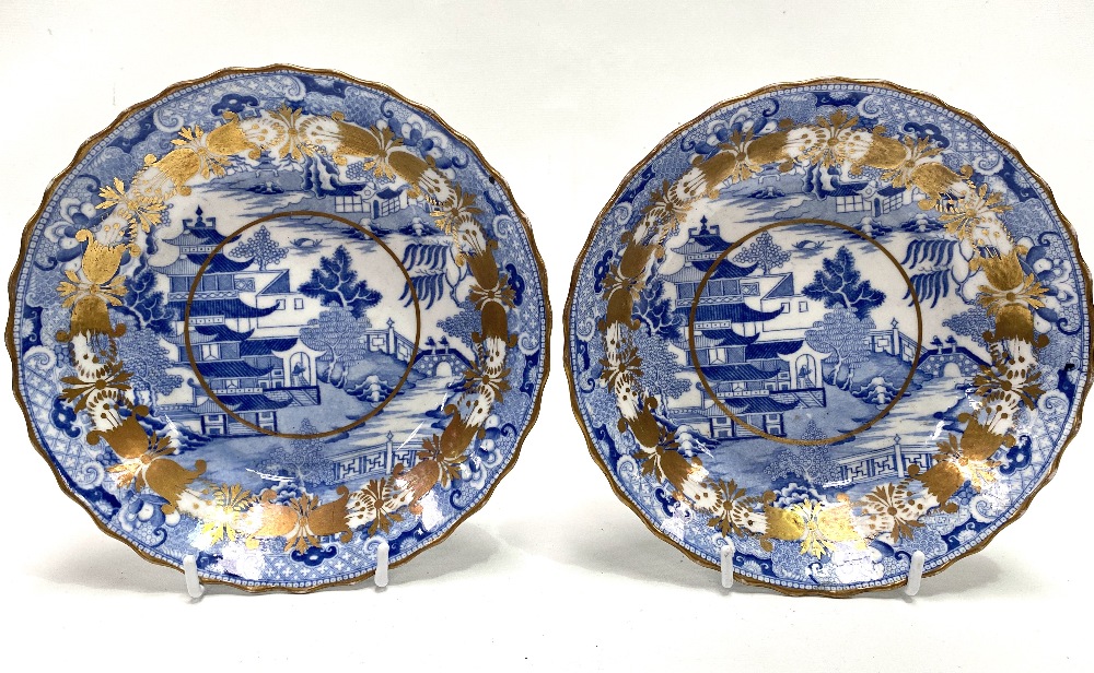 A pair of early 19th century Coalport blue and white transfer printed shallow bowls decorated with