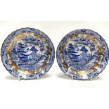 A pair of early 19th century Coalport blue and white transfer printed shallow bowls decorated with