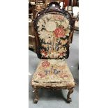 Victorian walnut framed tapestry upholstered nursing chair, the spoon shaped back with foliate