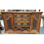 Early 20th Century French walnut break front sideboard, with three central drawers over two small