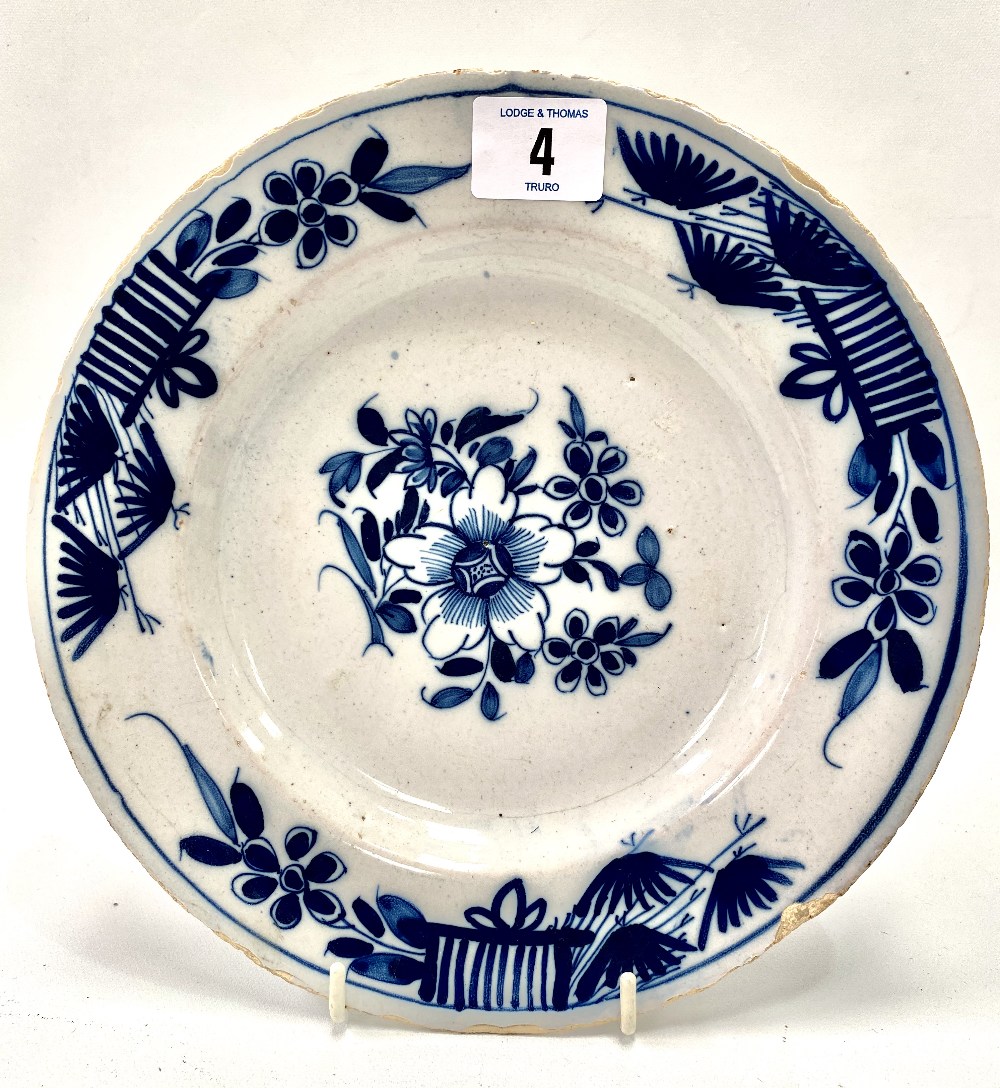 An 18th Century English blue and white Delft plate, foliate decorated, diameter 22.5cm.