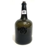An 18th Century sealed wine bottle of squat cylindrical form, the seal with crest, height 24.5cm (