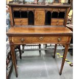 Edwardian fiddle mahogany inlaid writing desk, the raised top with a brass pierced gallery and