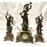 OF LEVANT MINE DISASTER INTEREST* A bronzed Spelter and green onyx clock garniture and with