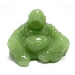 A Beijing green opaque glass Buddha, height 6.5cm.