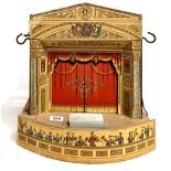 A Pollocks table-top theatre & with various cut-out figures & backdrops