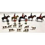 A Britains lead painted hunting set inc. five hunters on horseback, three standing hunters & nine