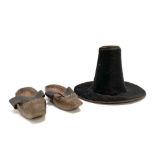 An early 20th century doll's moleskin Welsh hat, together with a pair of doll's carved wood clog
