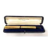A Swan self-filling pen by Mabie, Todd & Co. Ltd., London fountain pen, gold plated with Watermans