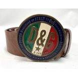 A Dolce & Gabbana brown leather belt with circular enamelled buckle and authenticity hologram tag,