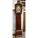 George III mahogany cased eight day long case clock, the arched 12in brass dial with silvered