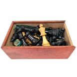 A Staunton pattern boxwood and ebony chess set with weighted pieces, height of queen 8cm.