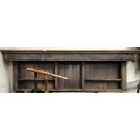Antique oak dresser top, the moulded cornice over a foliate scroll carved frieze and with two