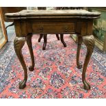 Early 18th Century walnut folding card table, the shaped boxwood line inlaid hinged top enclosing