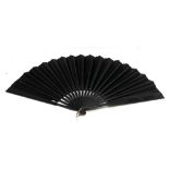 A Victorian carved wooden fan, boxed, length 35.5cm