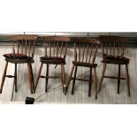 Set of four early 20th Century elm seat kitchen chairs.