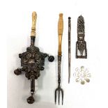 Miscellaneous items, including a silver embossed baby rattle with bone handle, a pickle fork with