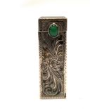 A white metal lipstick holder of square section, with green jadeite cabochon, the removable lipstick