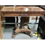 William IV flame mahogany veneered tea table with turned and fluted pillar on quadraform plateau